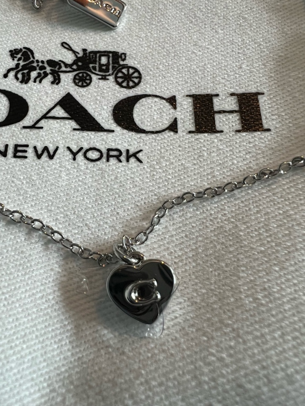 COACH Silver Heart Charm Necklace - Picture 2 of 3